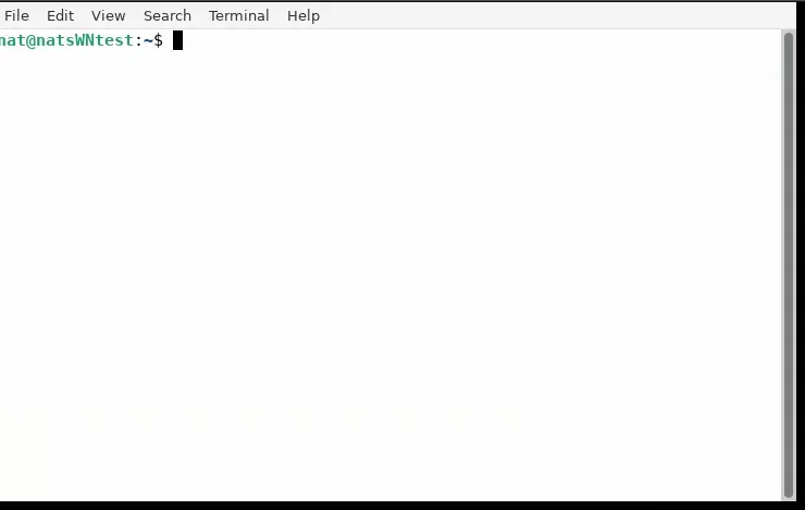 A basic looking terminal similar in appearance to the Windows NotePad with a menu bar at the top and the a line containing the "username@hostname:" prefix common to command line terminals.
